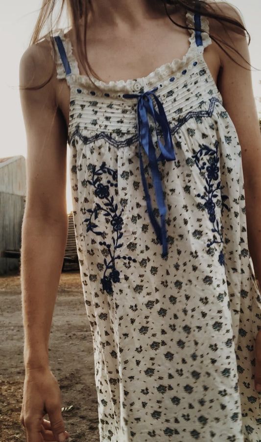 100% RECYCLED COTTON - NIGHTINGALE HAND SMOCKED MIDI DRESS BLUE ROSE FLORAL