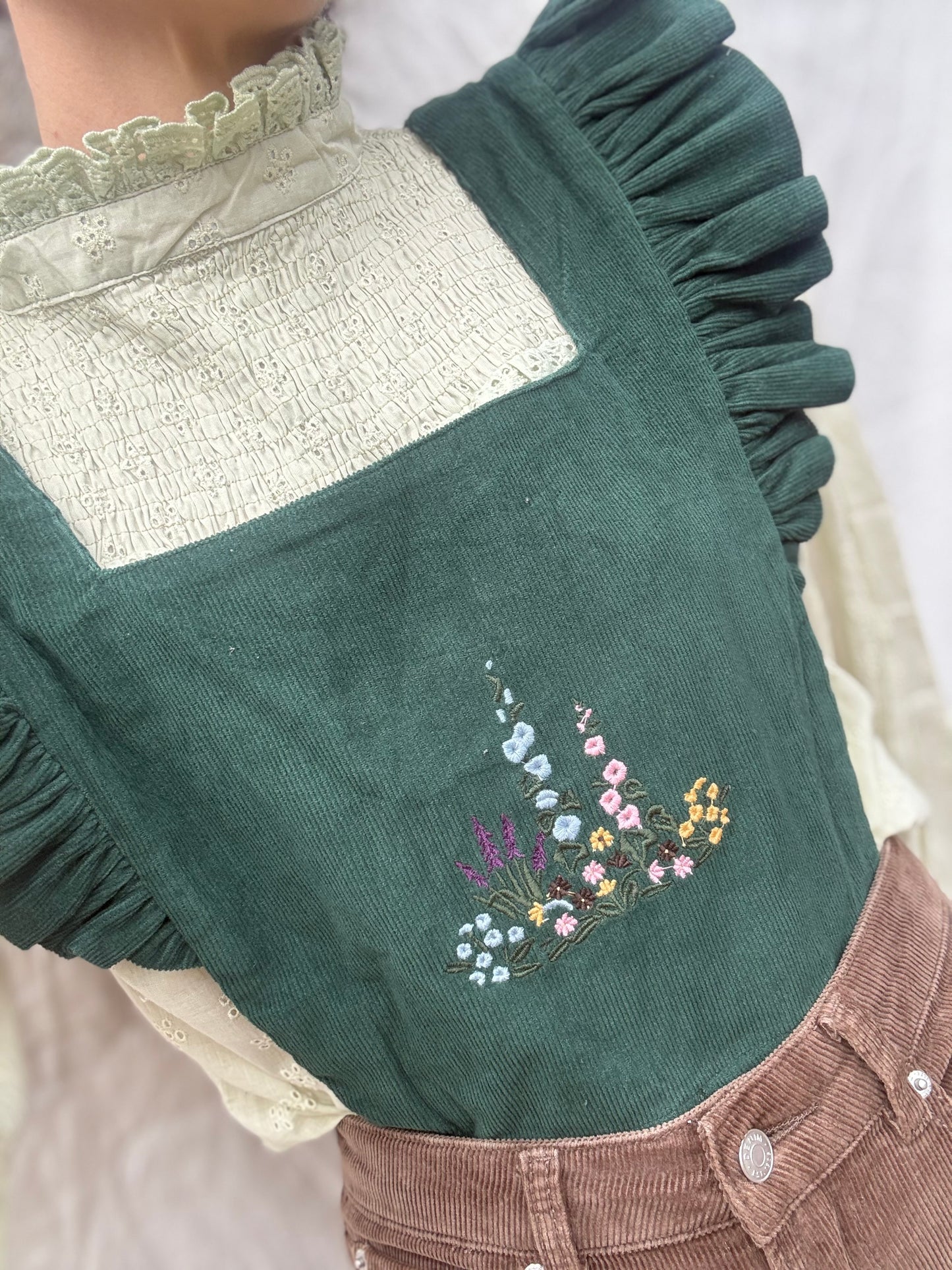 100% RECYCLED COTTON - ANOUK RUFFLE PINAFORE/SKIRT CORDUROY FOREST GREEN