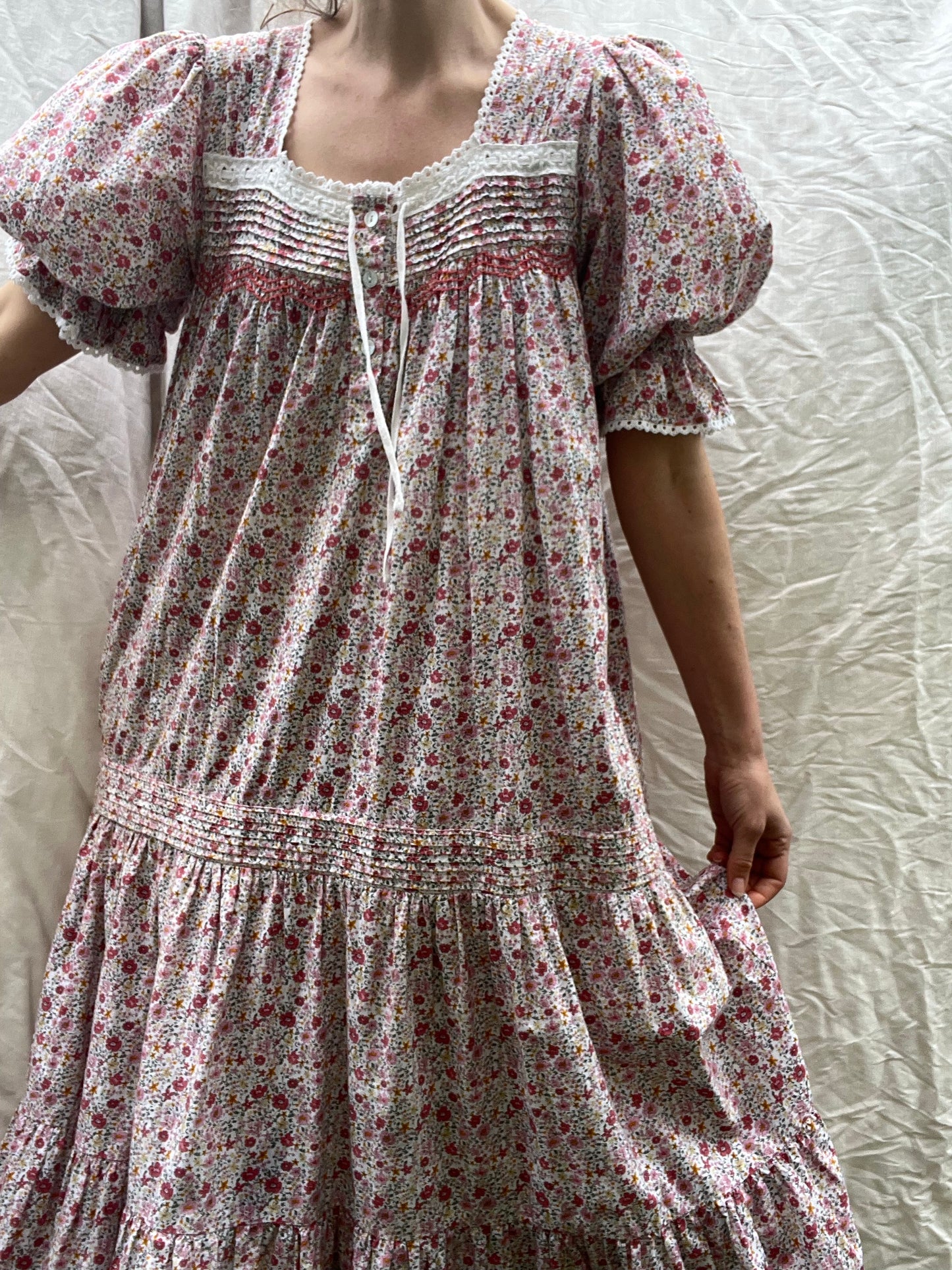 100% RECYCLED COTTON - MORNING SONG HAND SMOCKED TIERED DRESS - PINK DITSY FLORAL