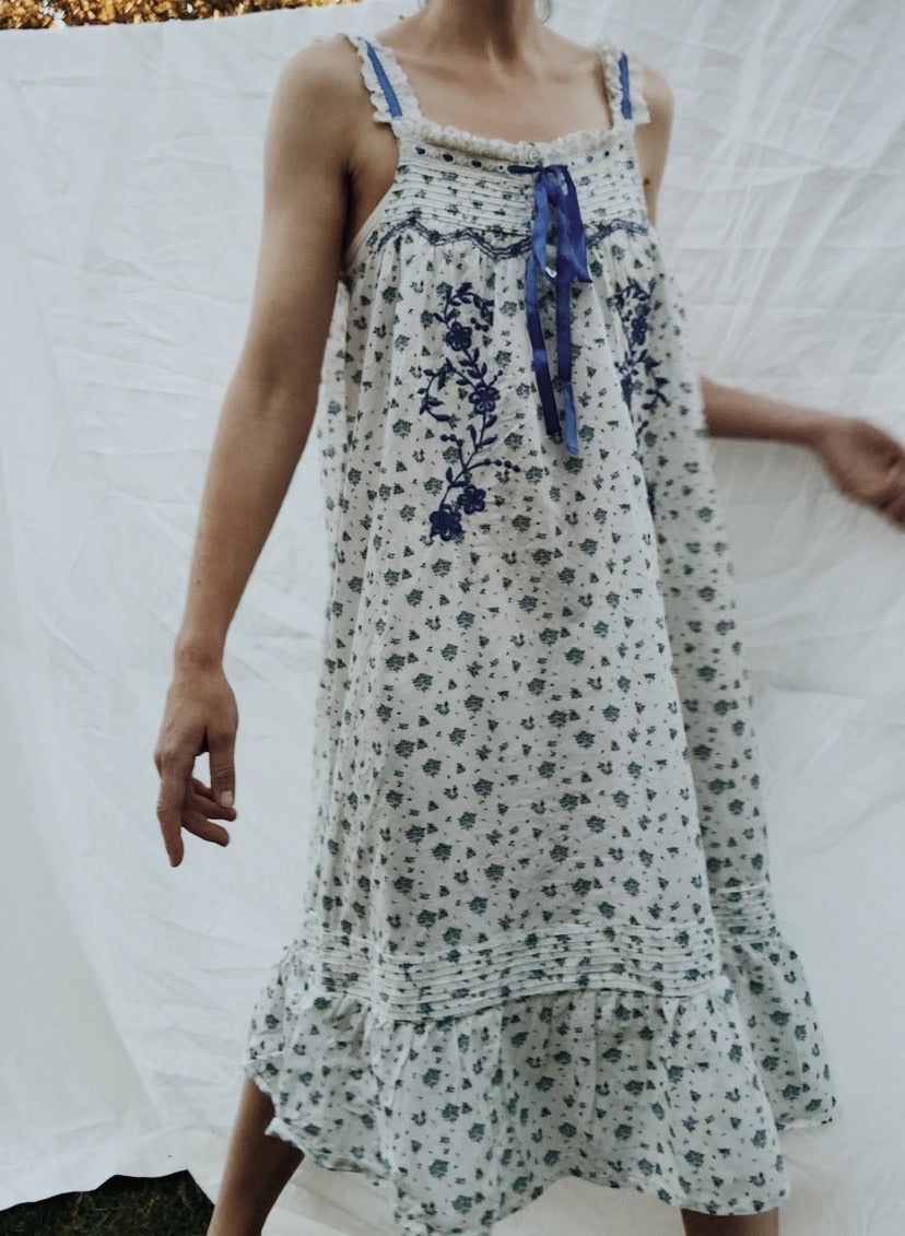 100% RECYCLED COTTON - NIGHTINGALE HAND SMOCKED MIDI DRESS BLUE ROSE FLORAL